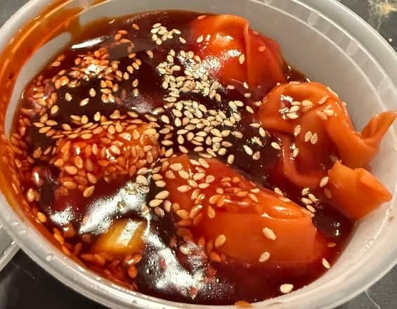 Steamed Wonton with Sesame Sauce.